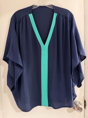 Blue colorblock blouse V-neck. Size L